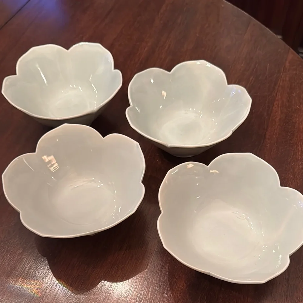 Set of four celadon lotus bowls